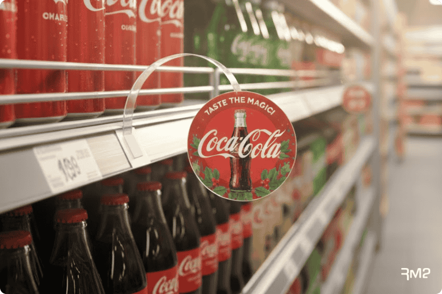 Como o Wobbler é fixado na prateleira?